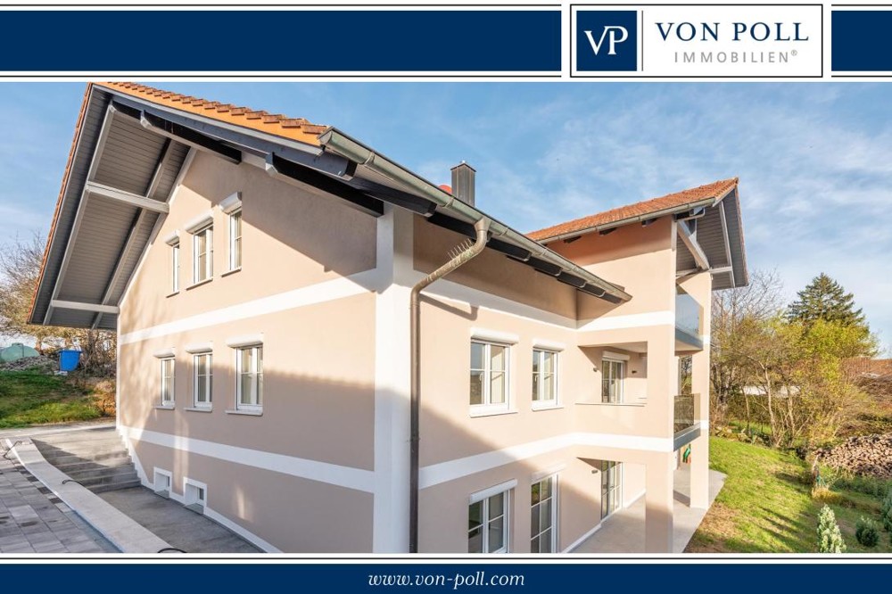 Hochwertig sanierte Wohnung mit moderner EBK, Süd-Terrasse und kleinem Garten