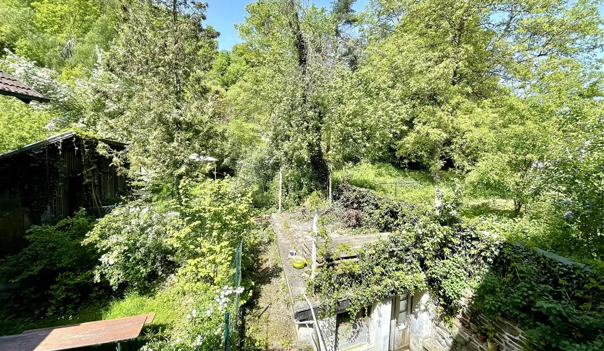 Einzigartiges Einfamilienhaus mit PV/Solarthermie und verwunschenem Garten