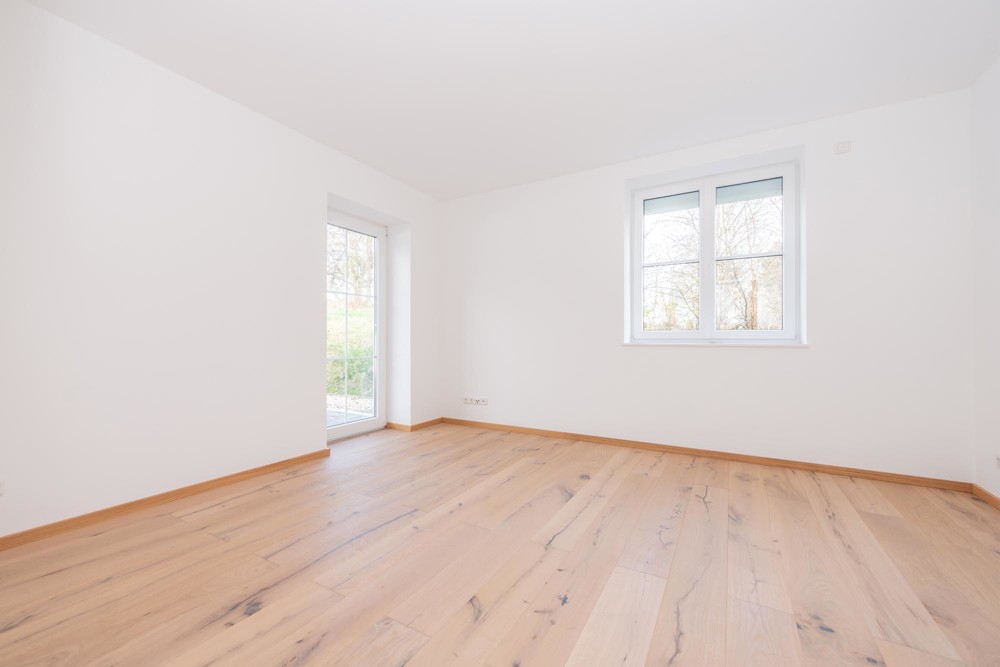Schlafzimmer mit Zugang zur Terrasse