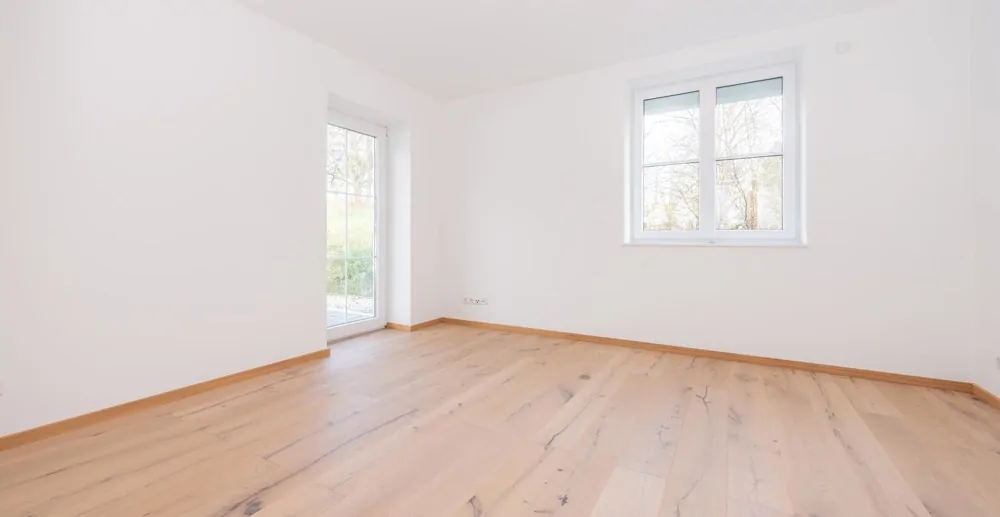 Schlafzimmer mit Zugang zur Terrasse