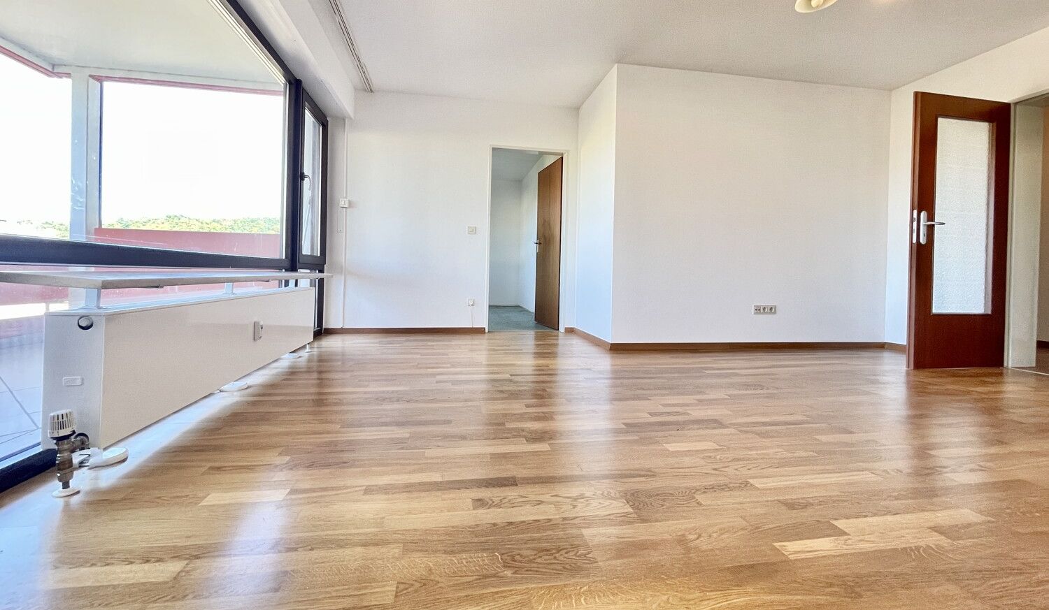 Schöne 3 Zi.-Whg. mit TG-Stellplatz und West-Loggia