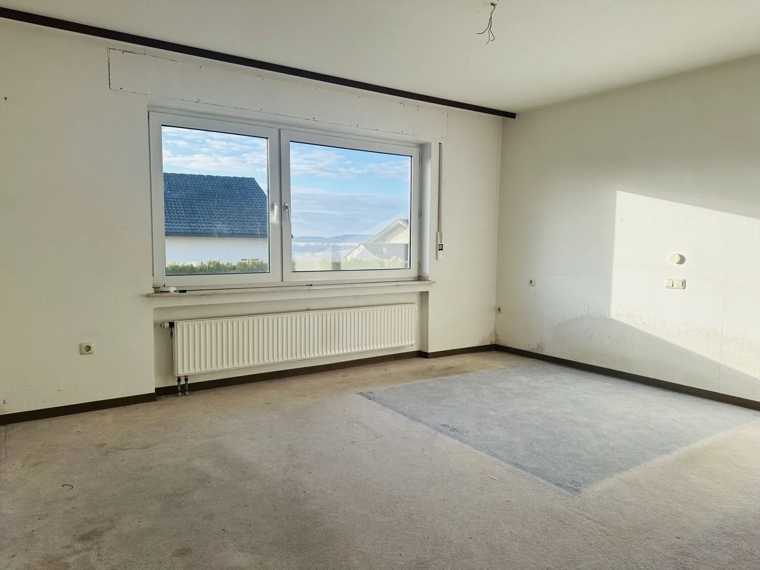 eines der Zimmer EG-Wohnung