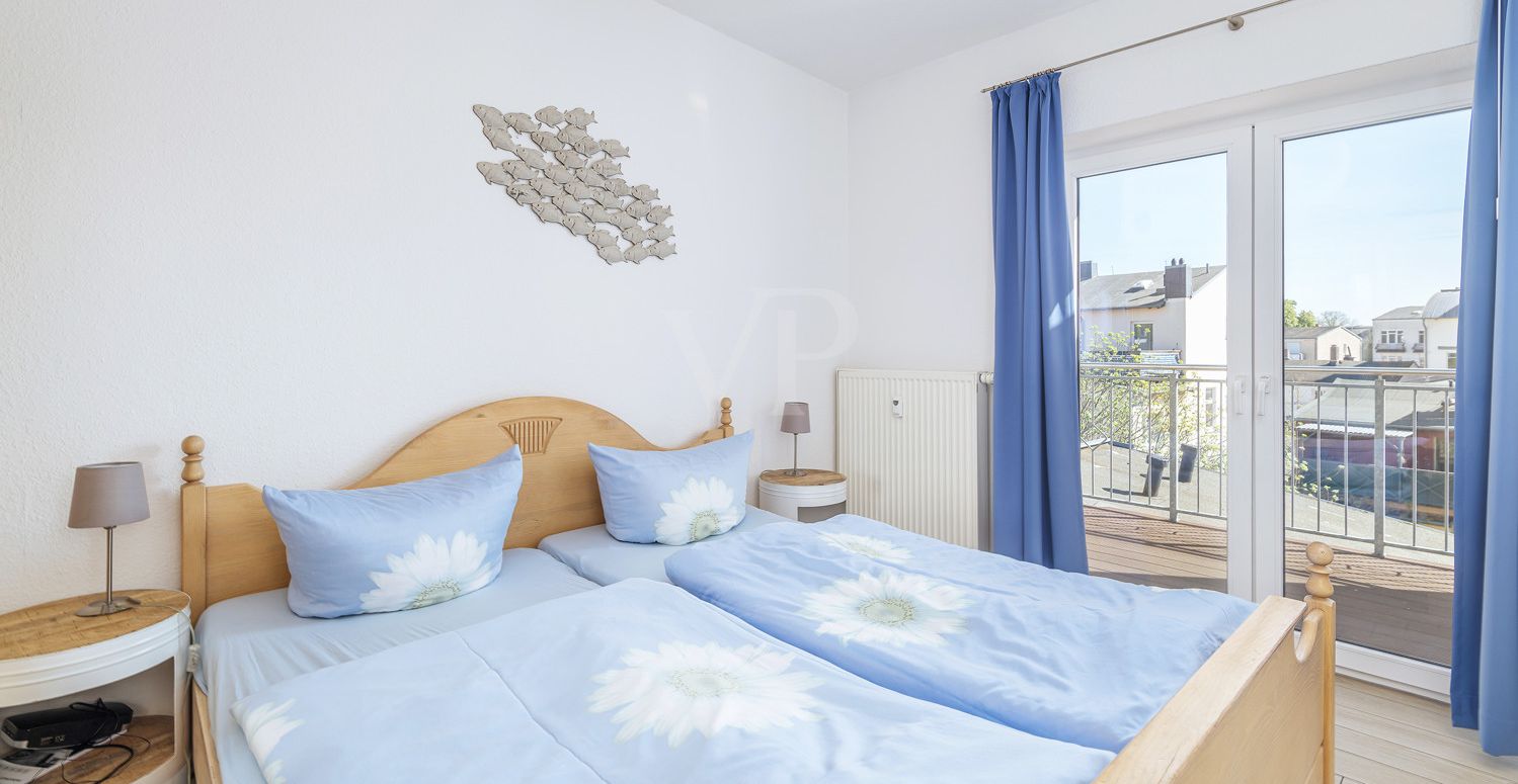 Schlafzimmer mit Balkonzugang