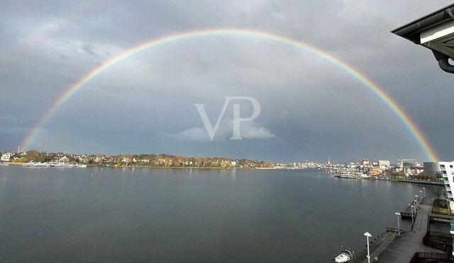 Impressionen vor Ort Regenbogen über der Warnow