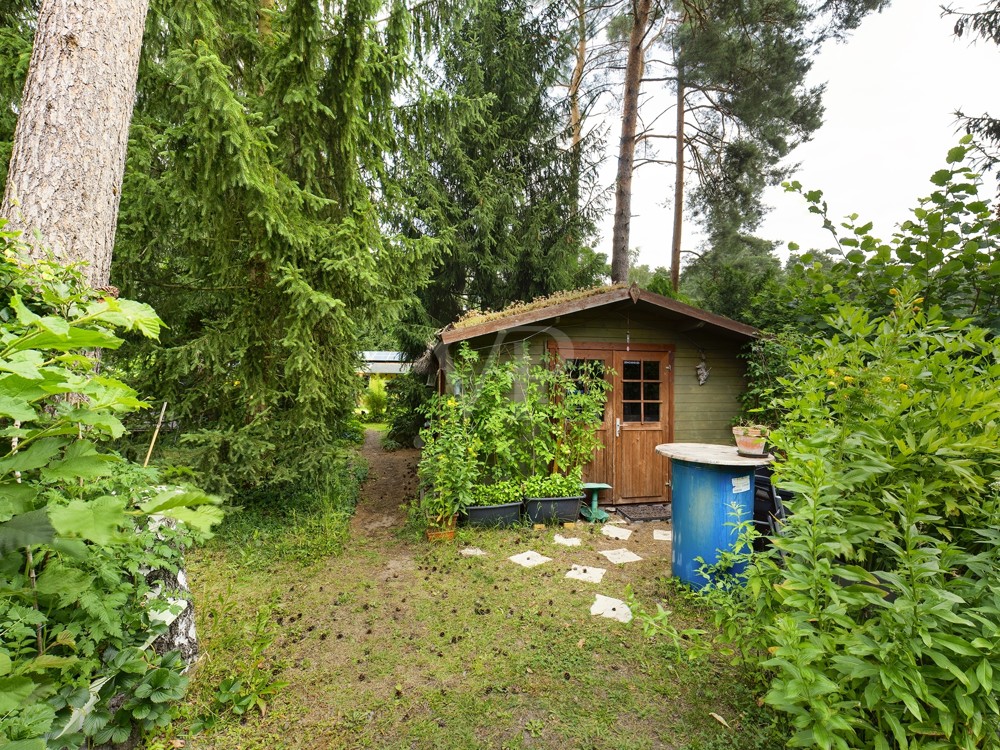 Holzhaus für Waschmaschinenplatz und Atelier