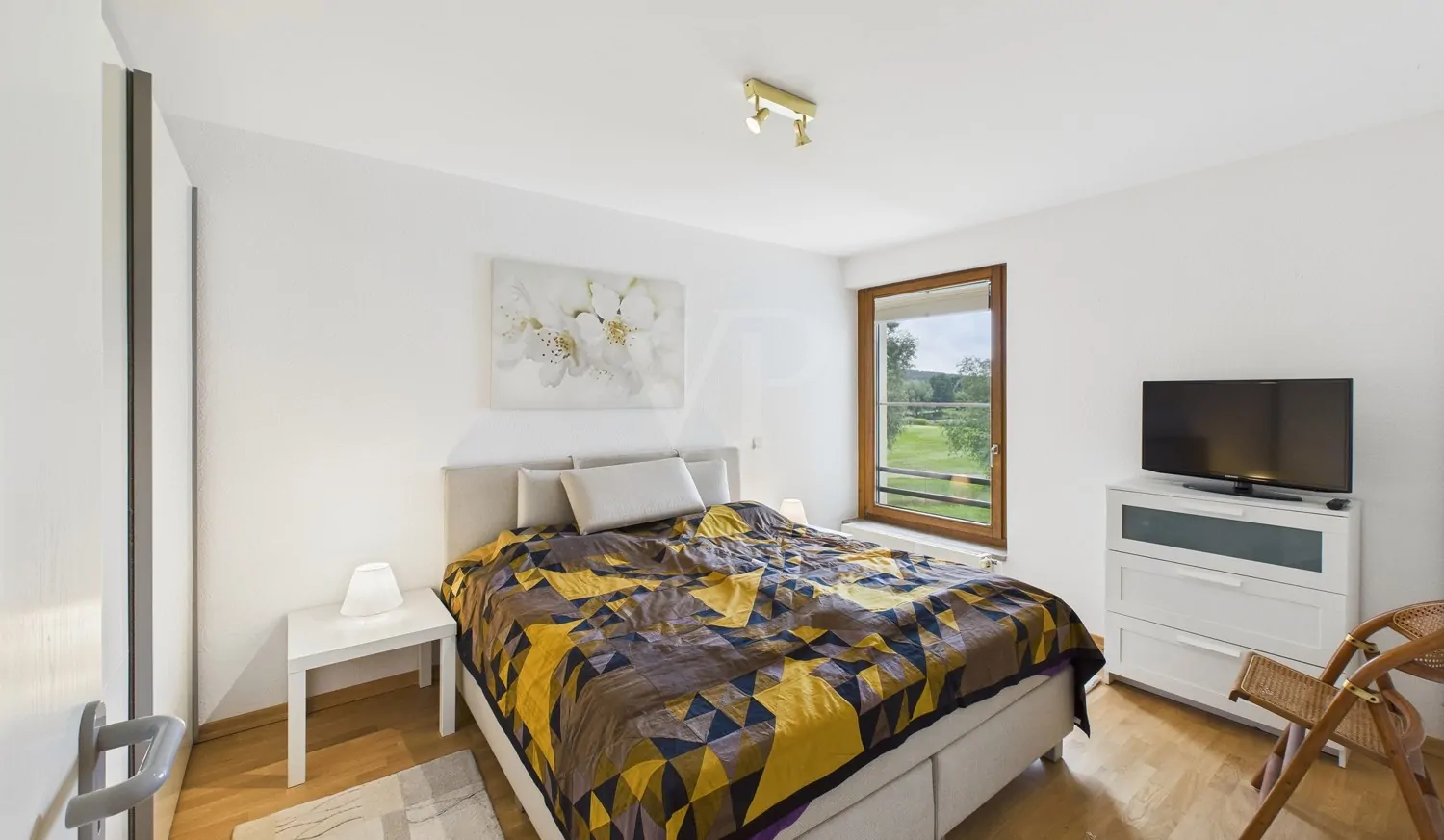 Schlafzimmer mit Blick auf den Golfplatz