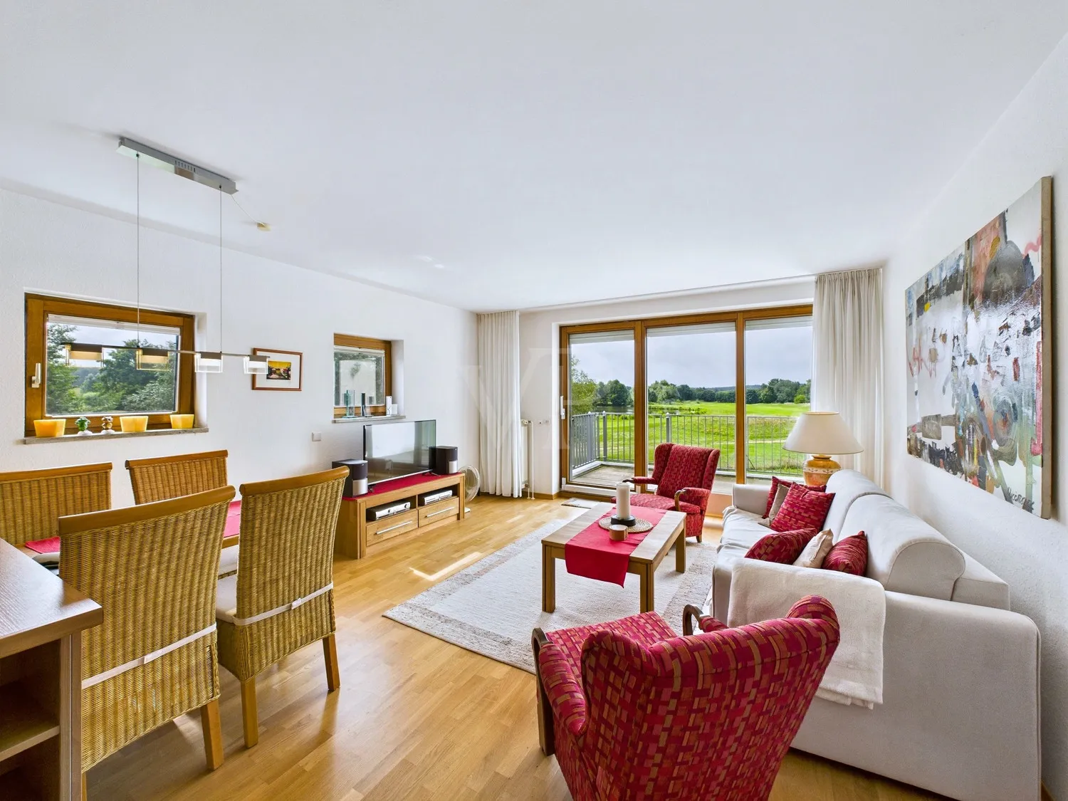 Wohnzimmer mit Blick auf den Golfplatz
