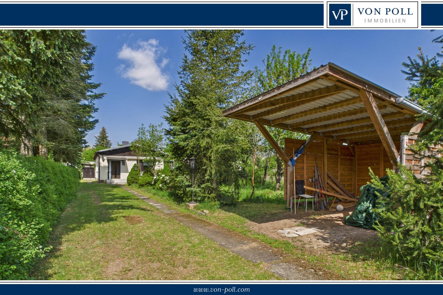 Sonniges Grundstück mit Bungalow und Carport