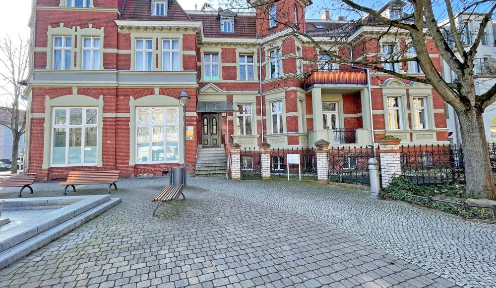 Denkmalgeschütztes Wohn- und Geschäftshaus