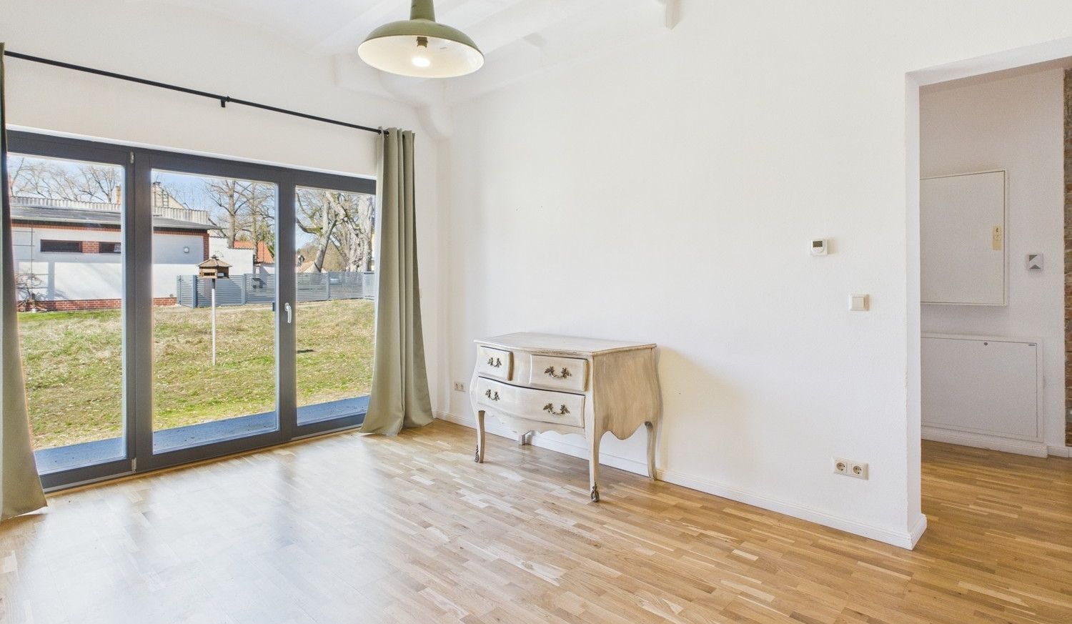 Wohnzimmer mit Terrasse