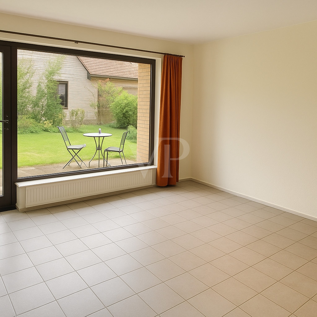 Wohnzimmer mit Blick ins Grün
