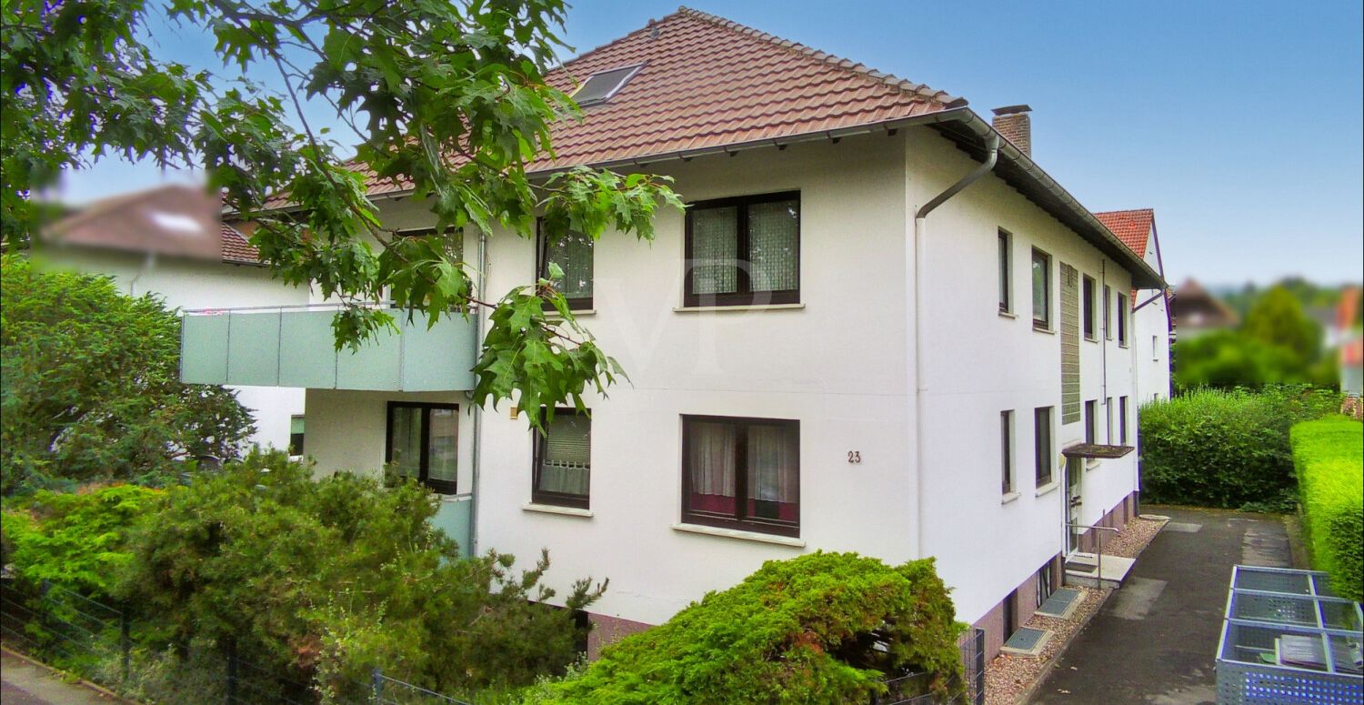 Titel_Hauseingang_Süd-Straßenansicht