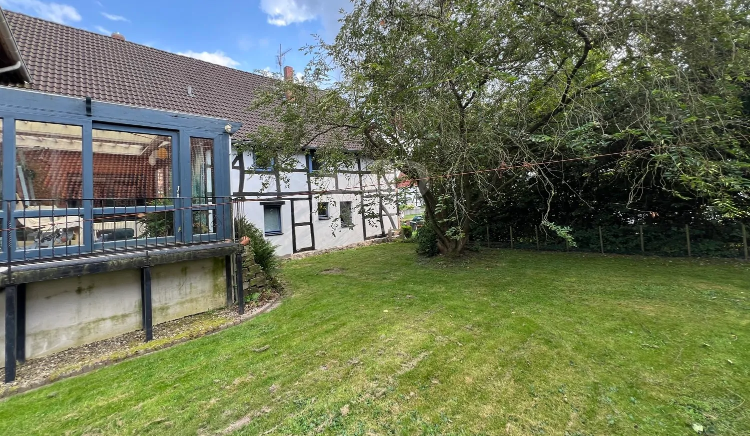 Gartenansicht-Wintergarten- Vorderhaus