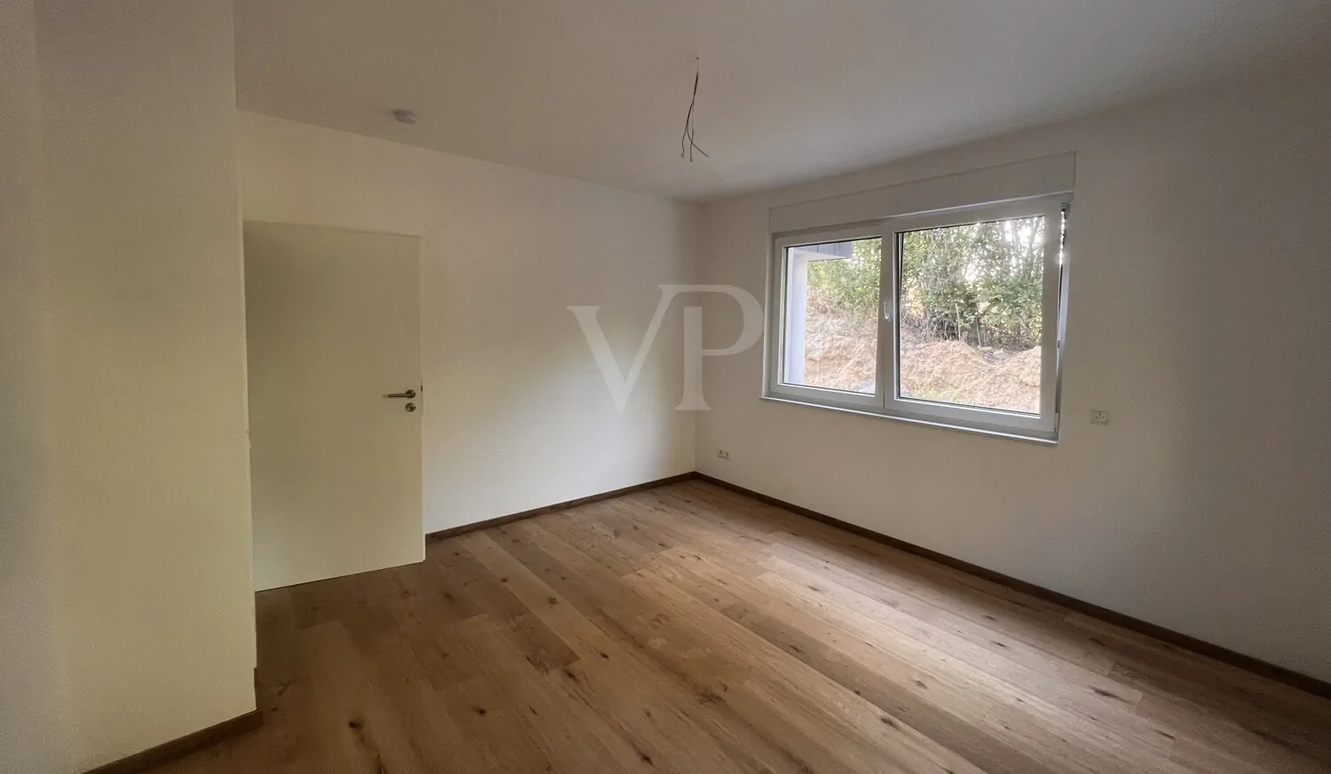 Eigentumswohnung im Erdgeschoss eines 4-Familienhauses (straßenabgewandt)