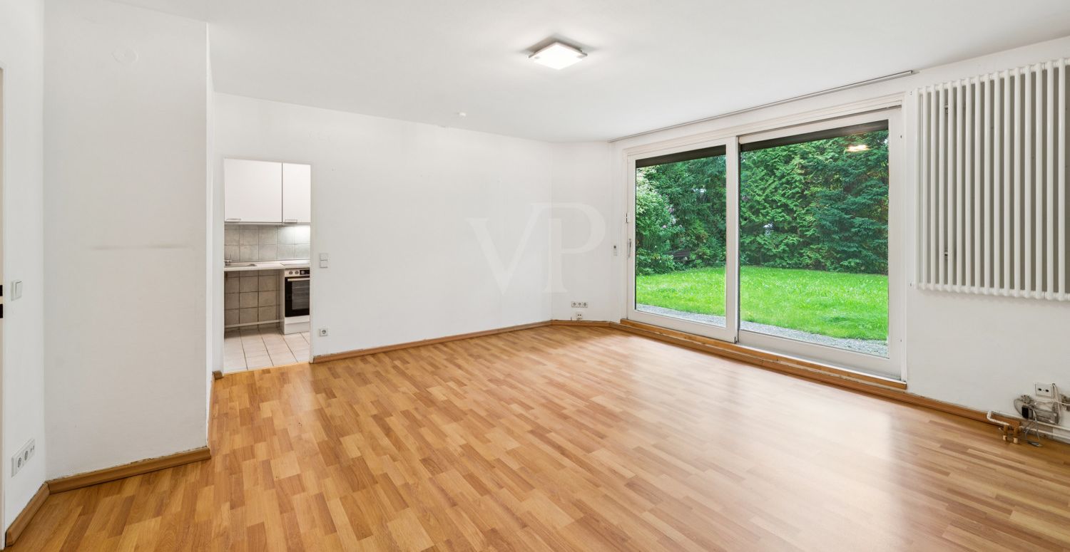 Wohn-/Schlafzimmer mit Zugang zur Terrasse