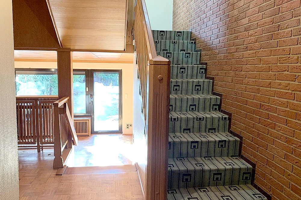 Treppe in das Obergeschoss