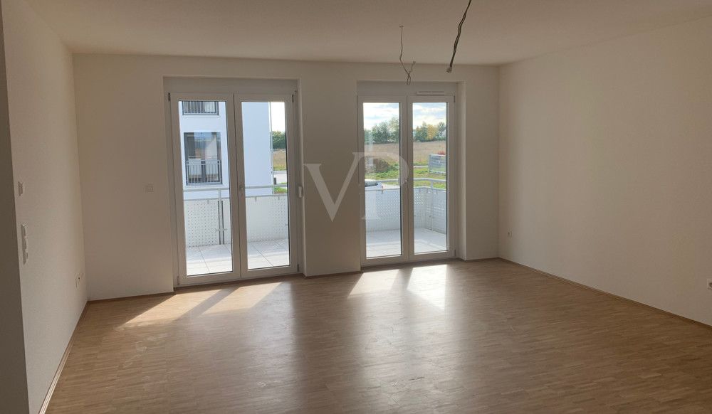 Wohnbereich mit Zugang zum Balkon