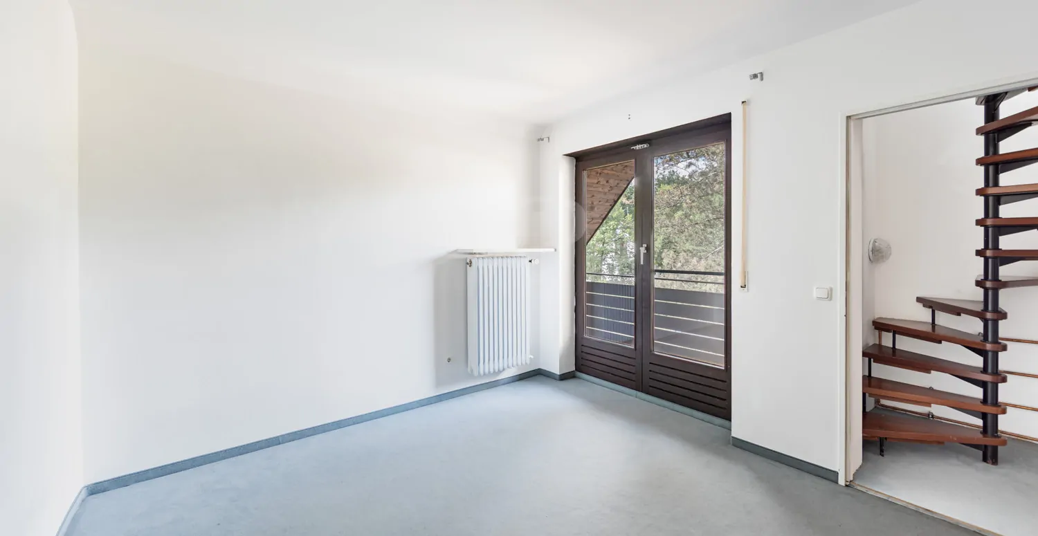 Schlafzimmer mit Balkon