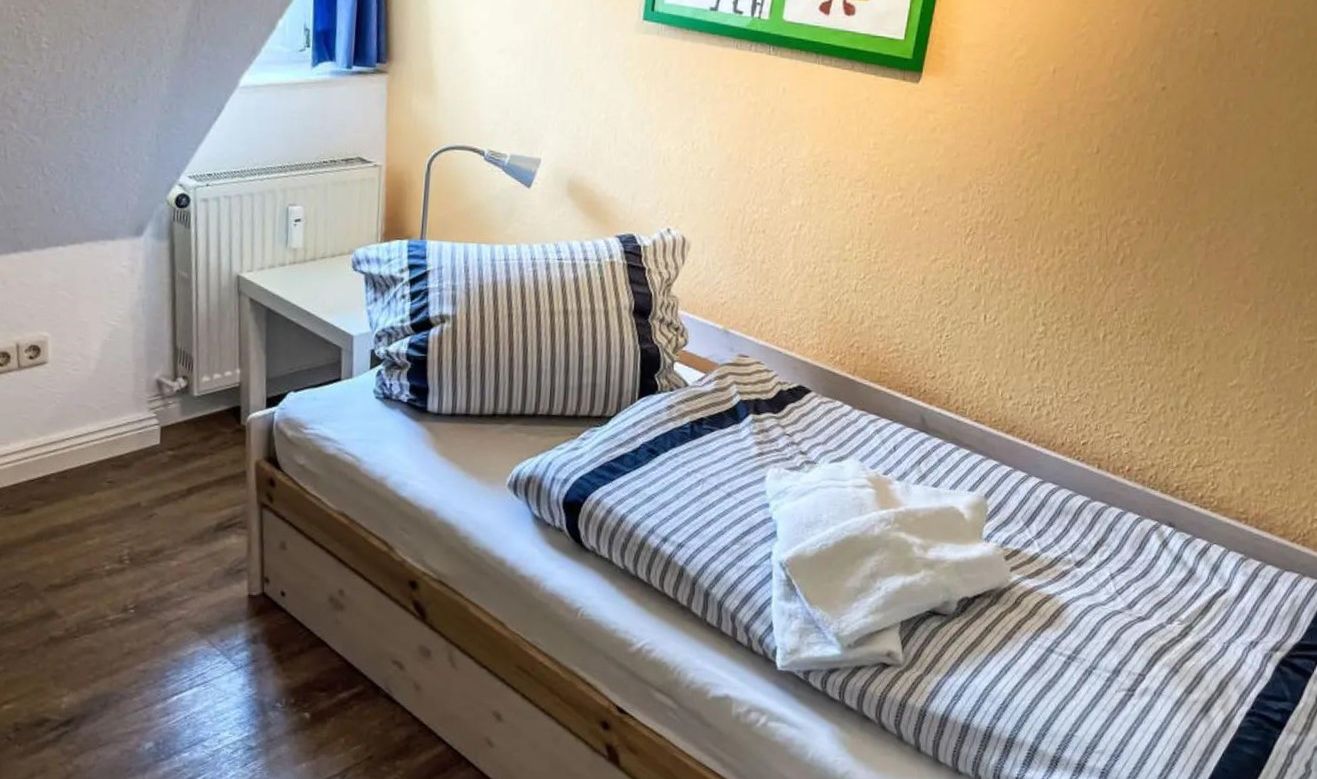 Gemütliches 4-Zimmer-Ferienhausteil unter Reet