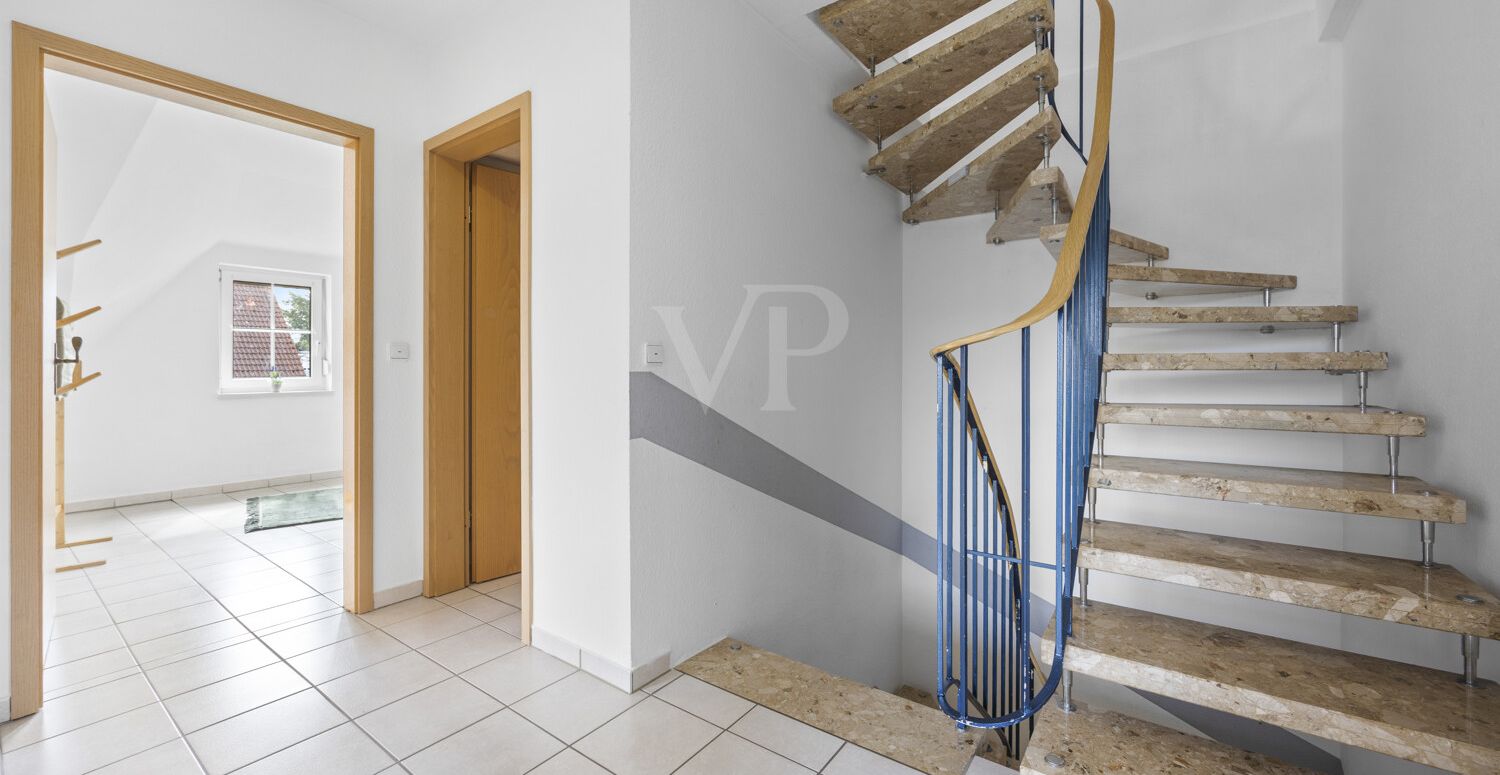 Weiterführende Treppe in das Dachgeschoss