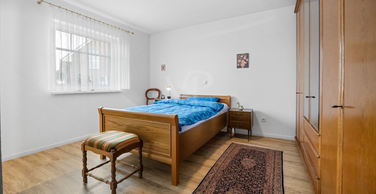 Das Schlafzimmer mit Bad en Suite