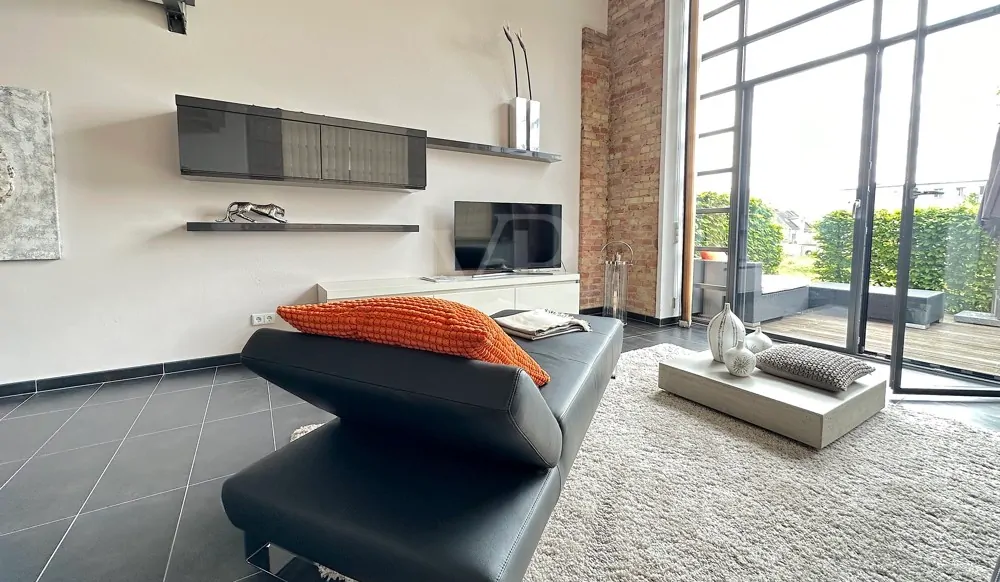 Wohnbereich mit Zugang zu Terrasse