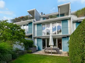 Gemütliches 5.5 Zimmer-Reihenmittelhaus mit Garten und zwei Sonnenterrassen im Dachgeschoss