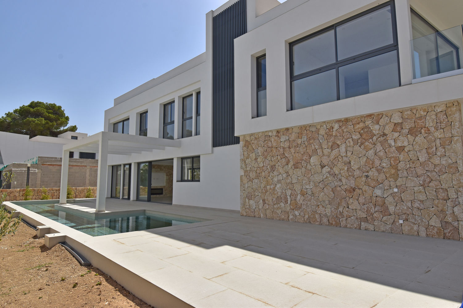 New build villa with pool and sea views in Son Veri Nou