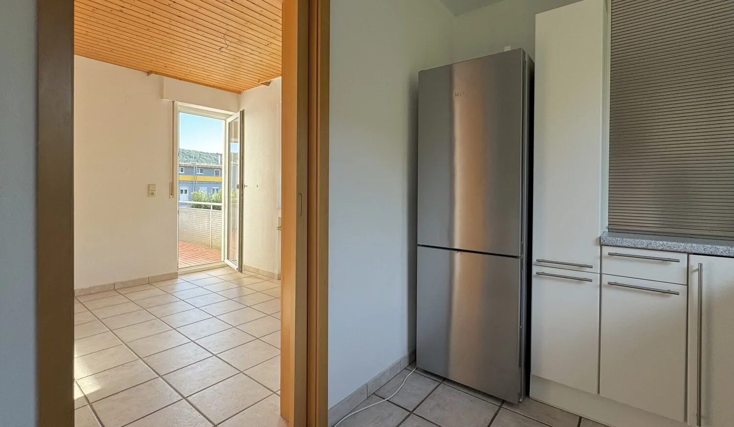 Küche mit Esszimmer und Balkon OG