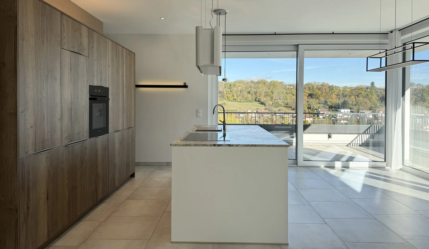 Erstbezug - Penthousewohnung mit Tiefgaragenstellplatz und Carport