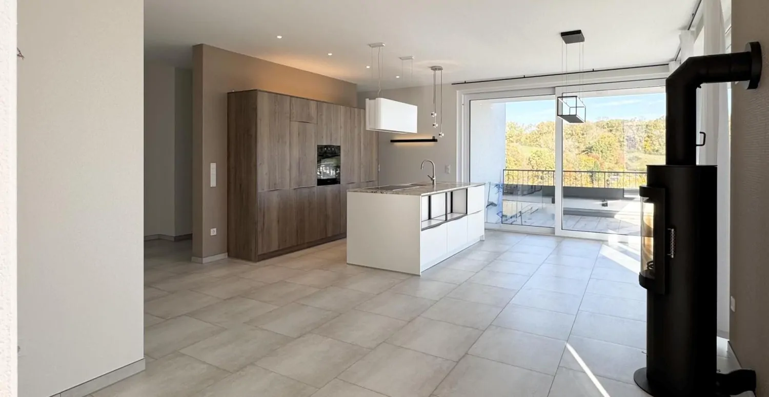 Erstbezug - Penthousewohnung mit Tiefgaragenstellplatz und Carport