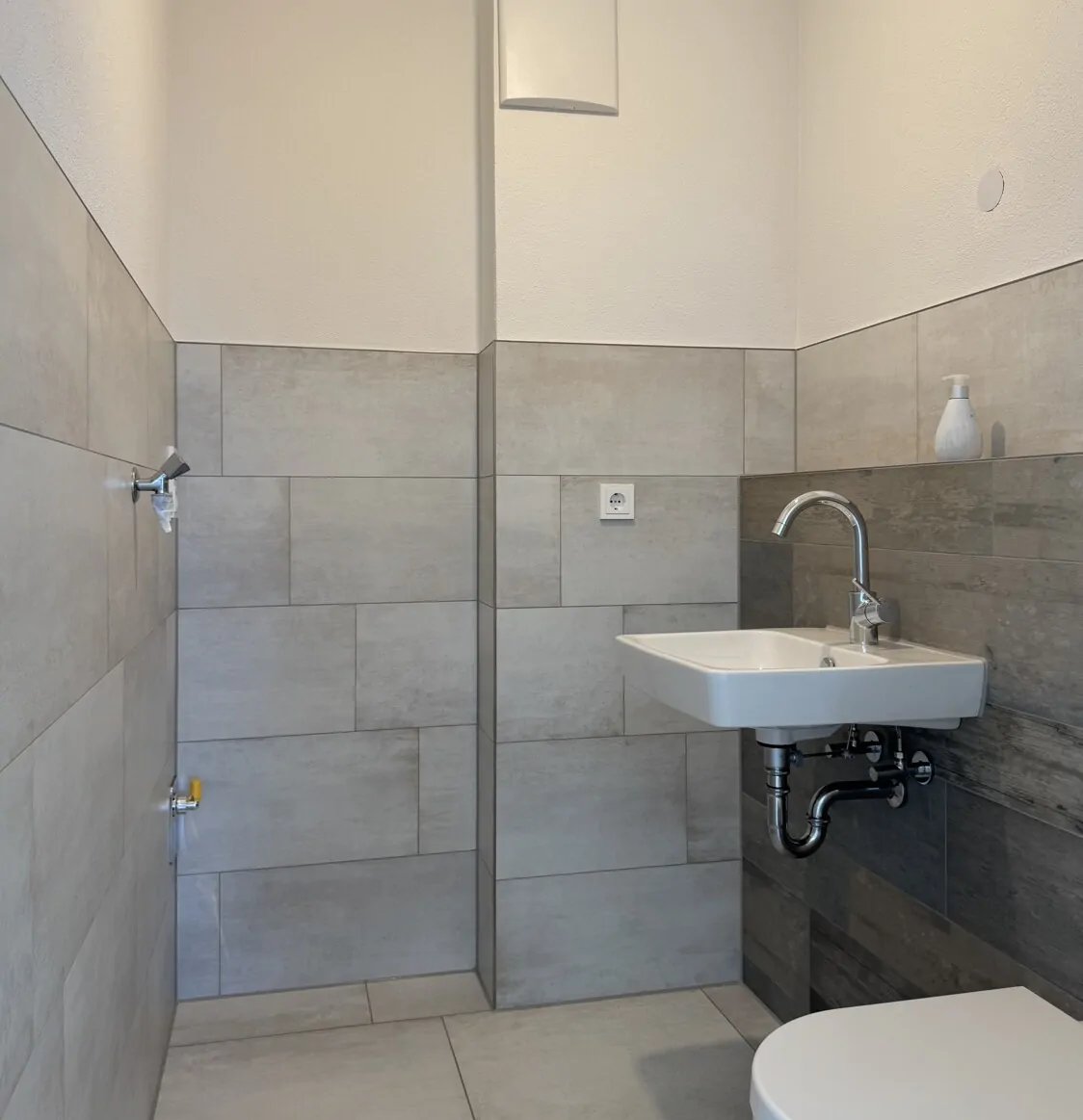 WC mit Waschmaschinenanschluss