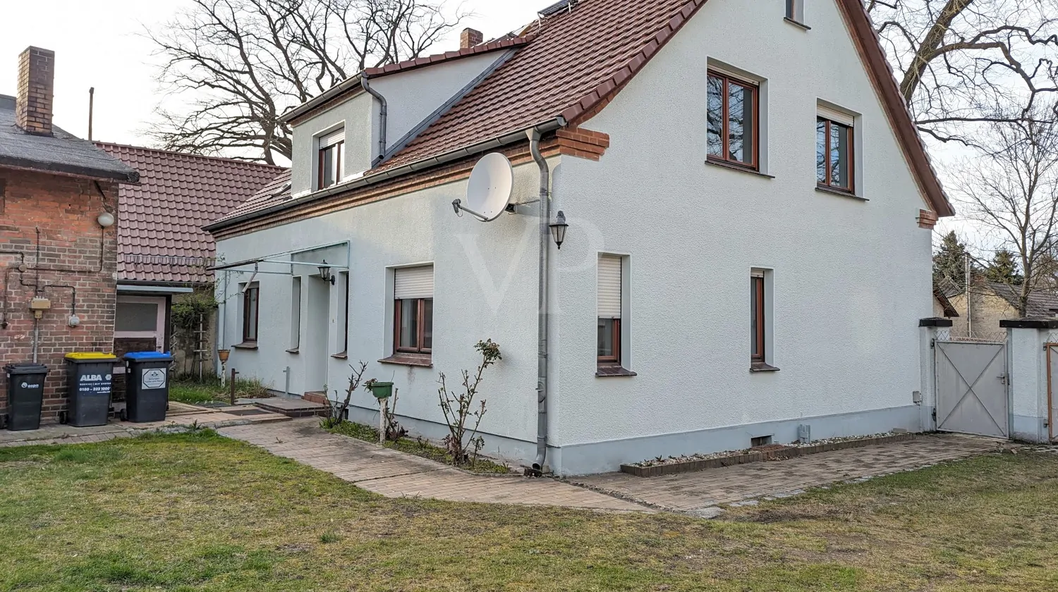 RÜCKANSICHT/HAUSEINGANG