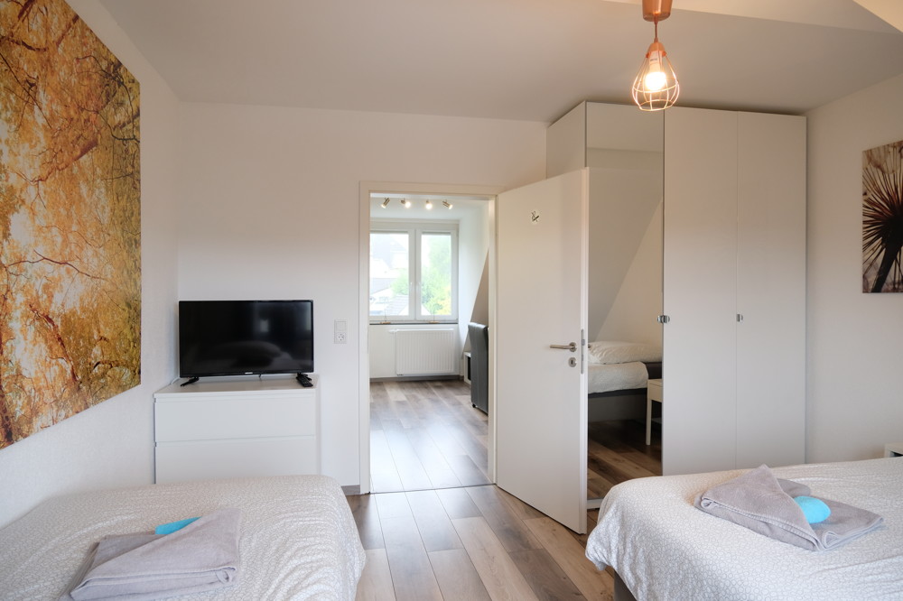 Dachgeschoss links_Wohnzimmer / Schlafzimmer