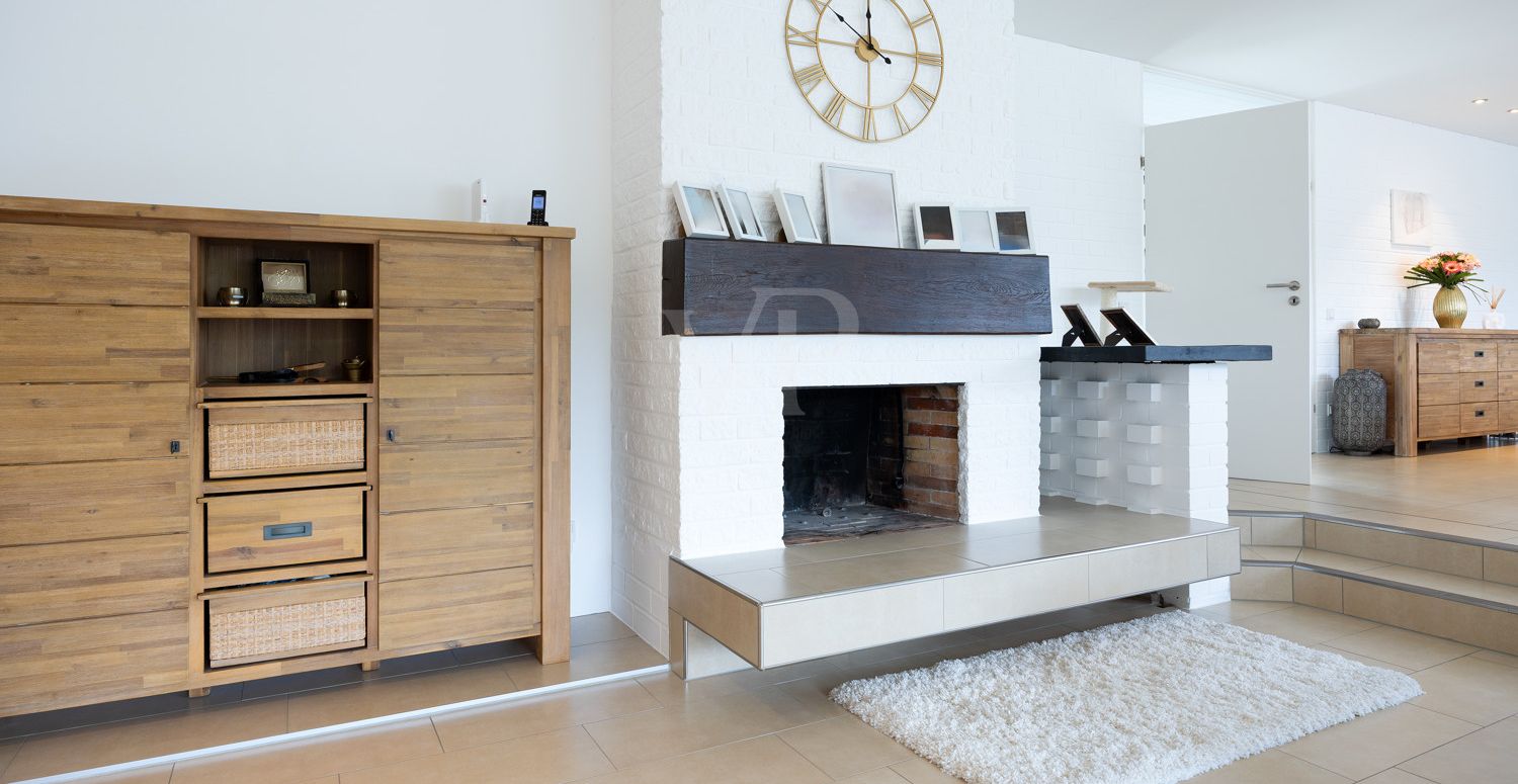 Wohnzimmer mit Kamin