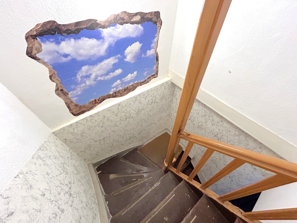 Treppenhaus mit Wandgemälde