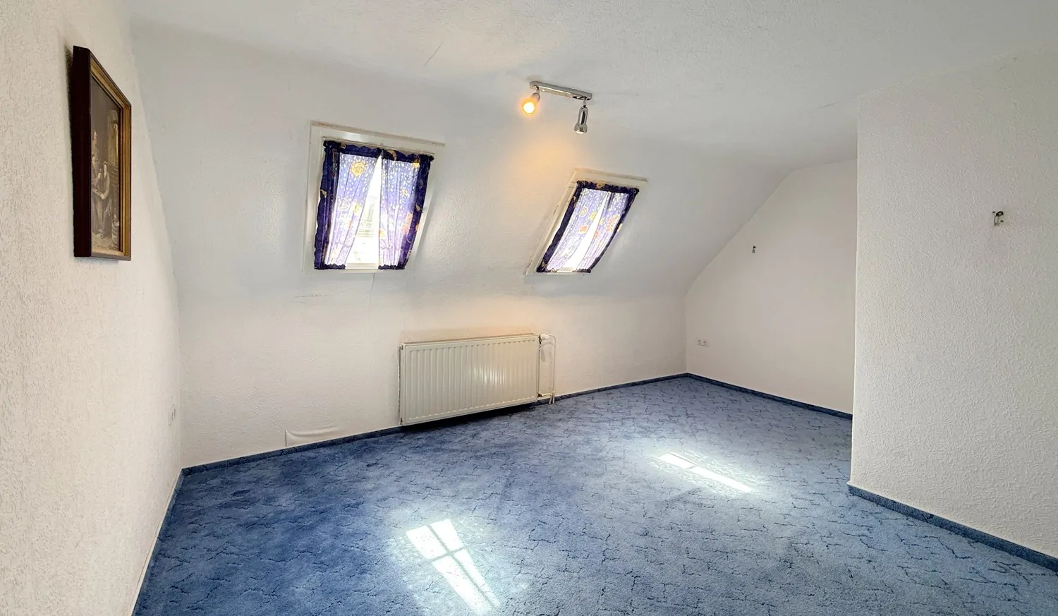 Schlafzimmer mit Dachfenster