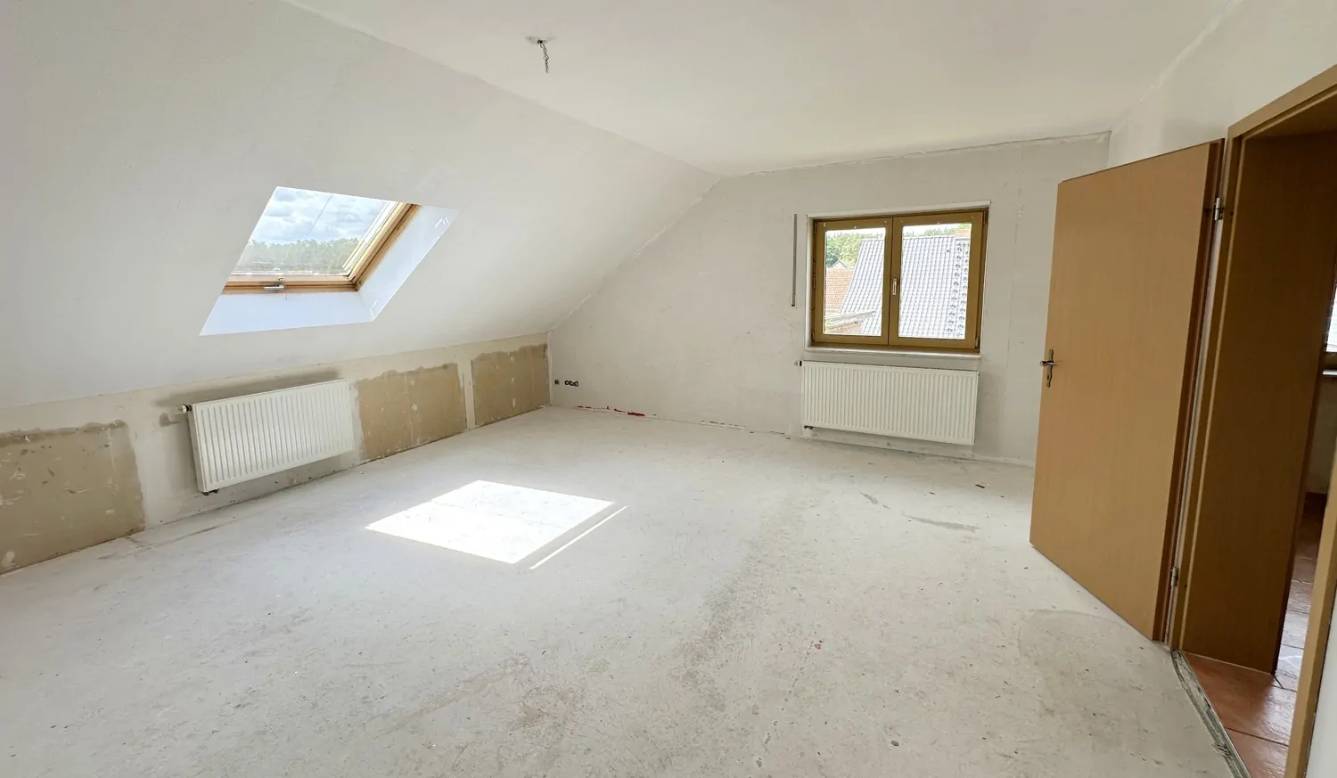 Wohn- und Esszimmer im Dachgeschoss