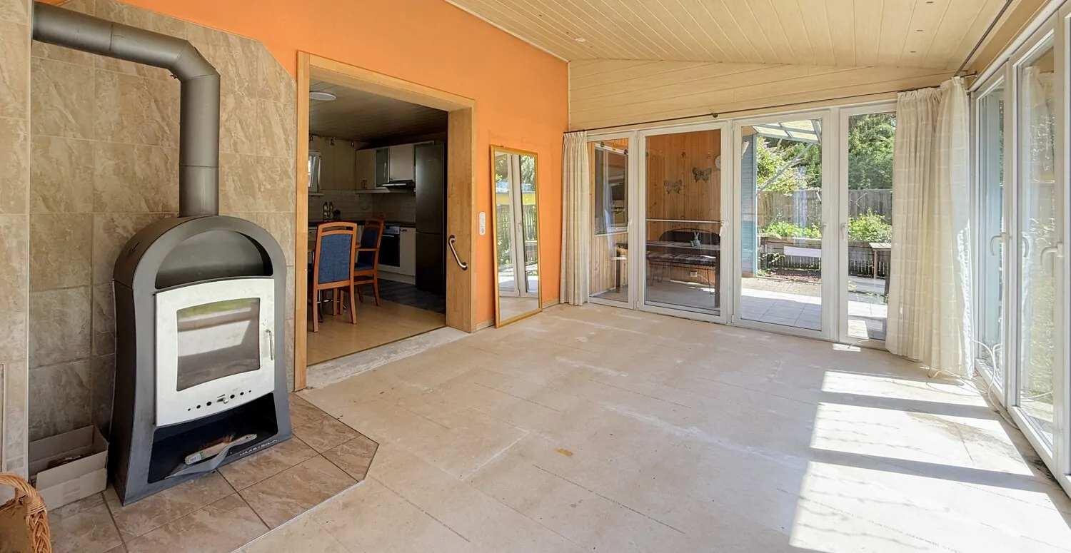 Wintergarten mit Kamin