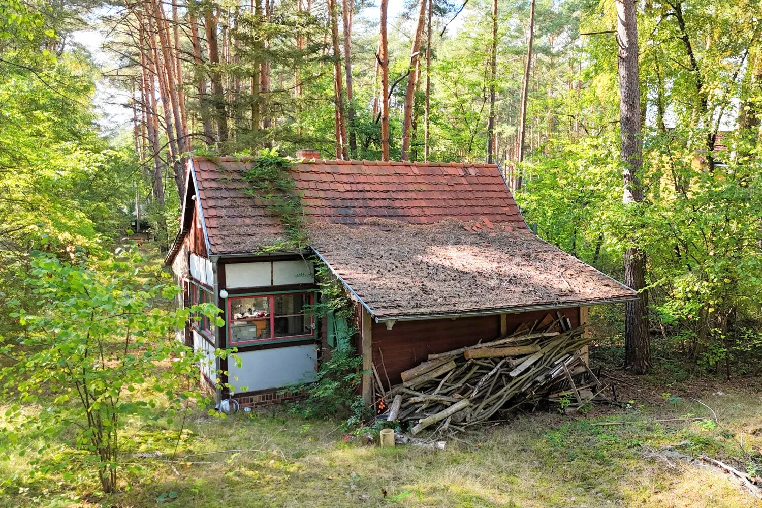 Häuschen mit Wintergarten, Küche, WC und Kamin