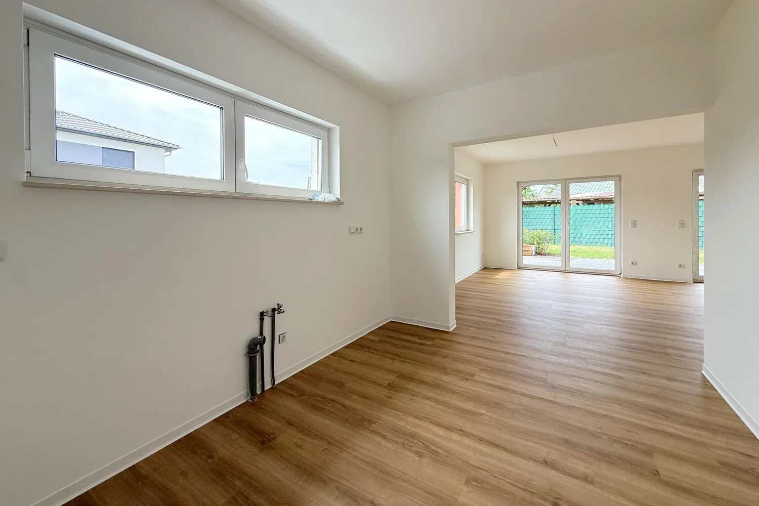 offene Küche mit direktem Zugang zum Wohnzimmer