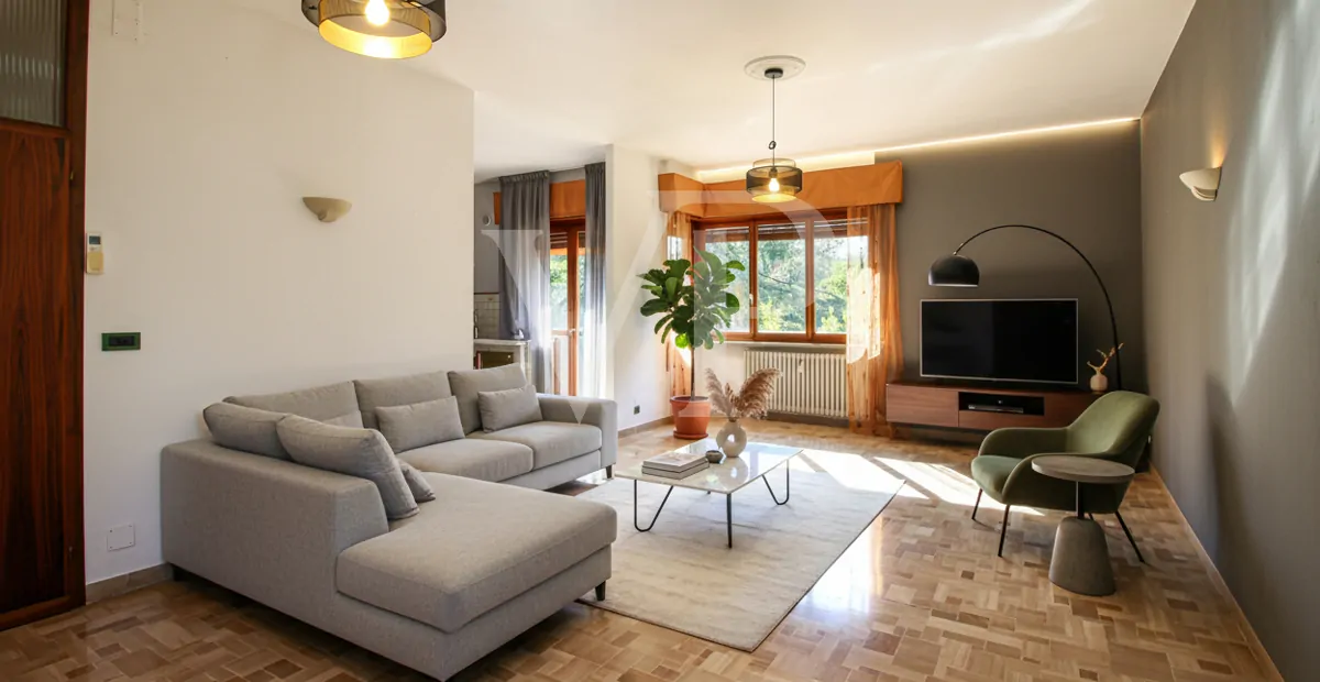 Geräumige und helle Drei-Zimmer-Wohnung mit privatem Garten