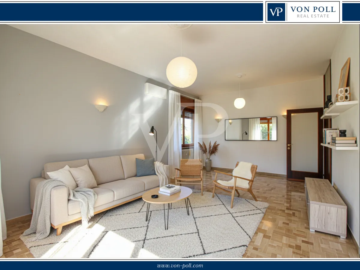 Geräumige und helle Drei-Zimmer-Wohnung mit privatem Garten