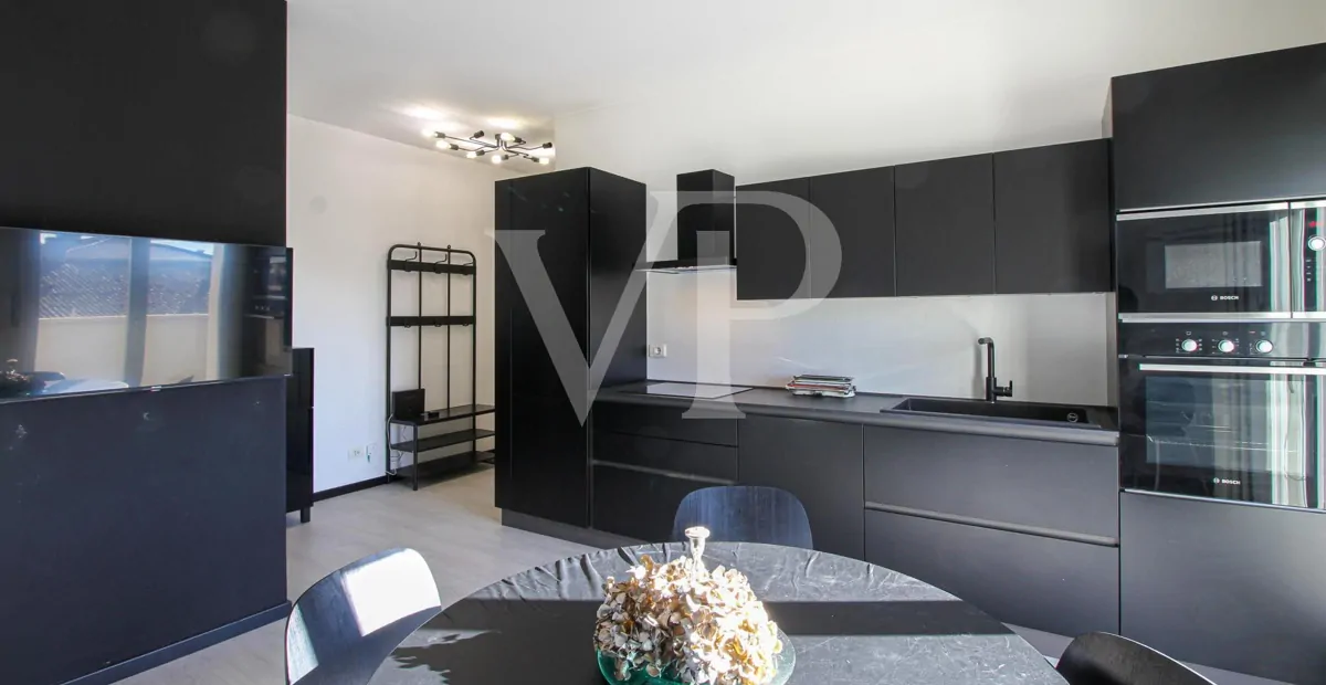 Moderne Zwei-Zimmer-Wohnung mit großer Terrasse und Doppelgarage