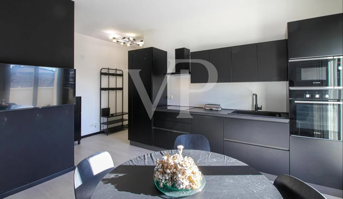 Moderne Zwei-Zimmer-Wohnung mit großer Terrasse und Doppelgarage