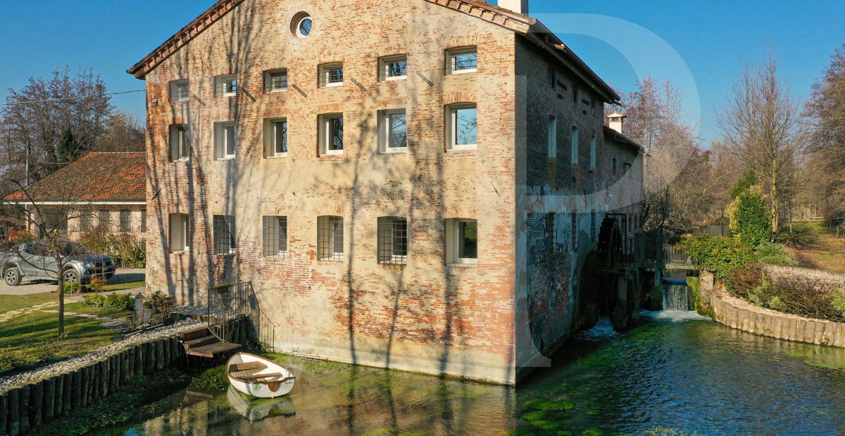 Charming water mill transformed
into a modern eco-sustainable house
