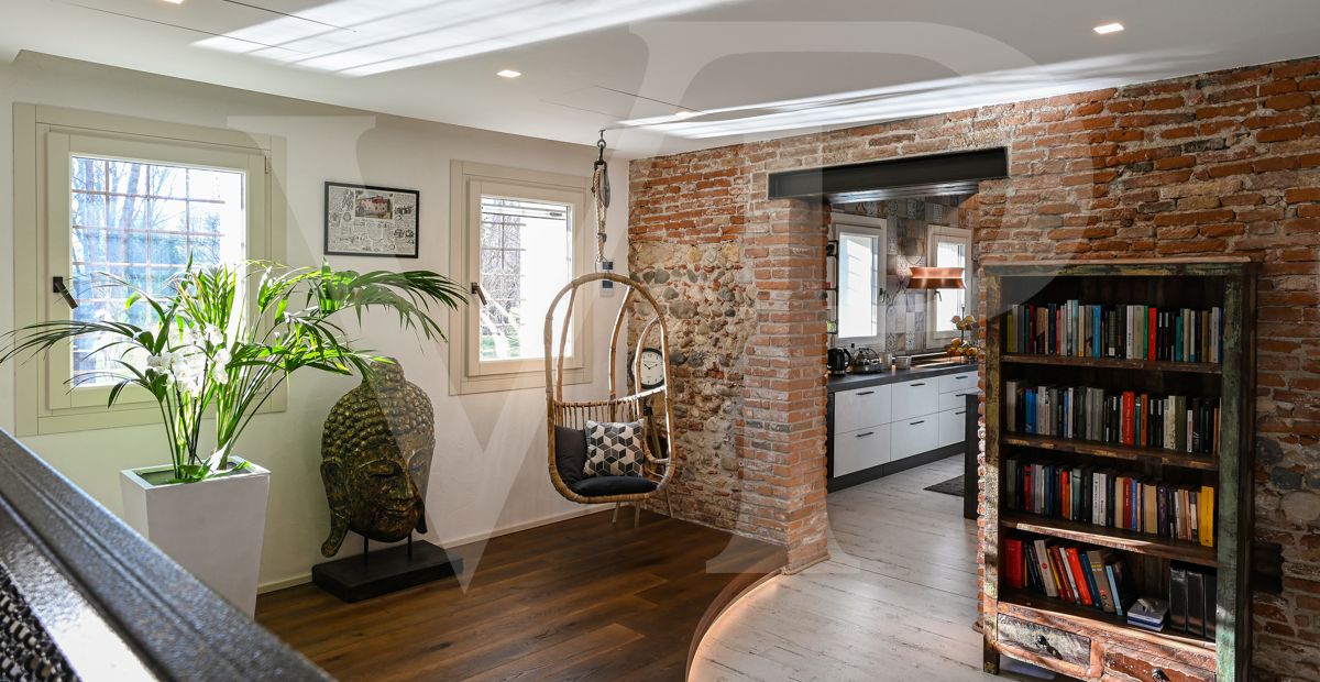 Charming water mill transformed
into a modern eco-sustainable house