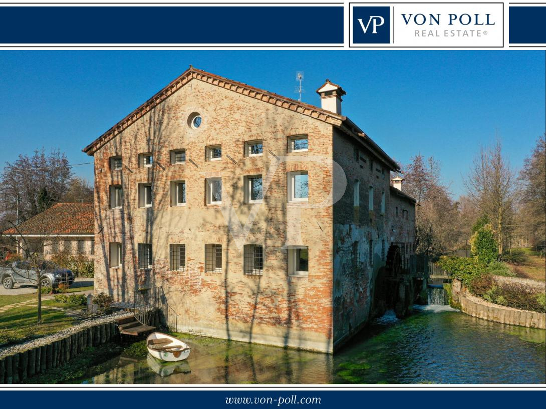 Charmant moulin transformé
en une maison moderne et écologique