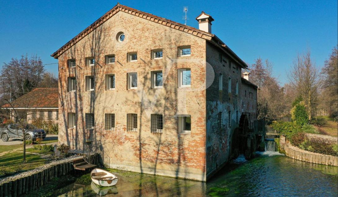 Charming water mill transformed
into a modern eco-sustainable house