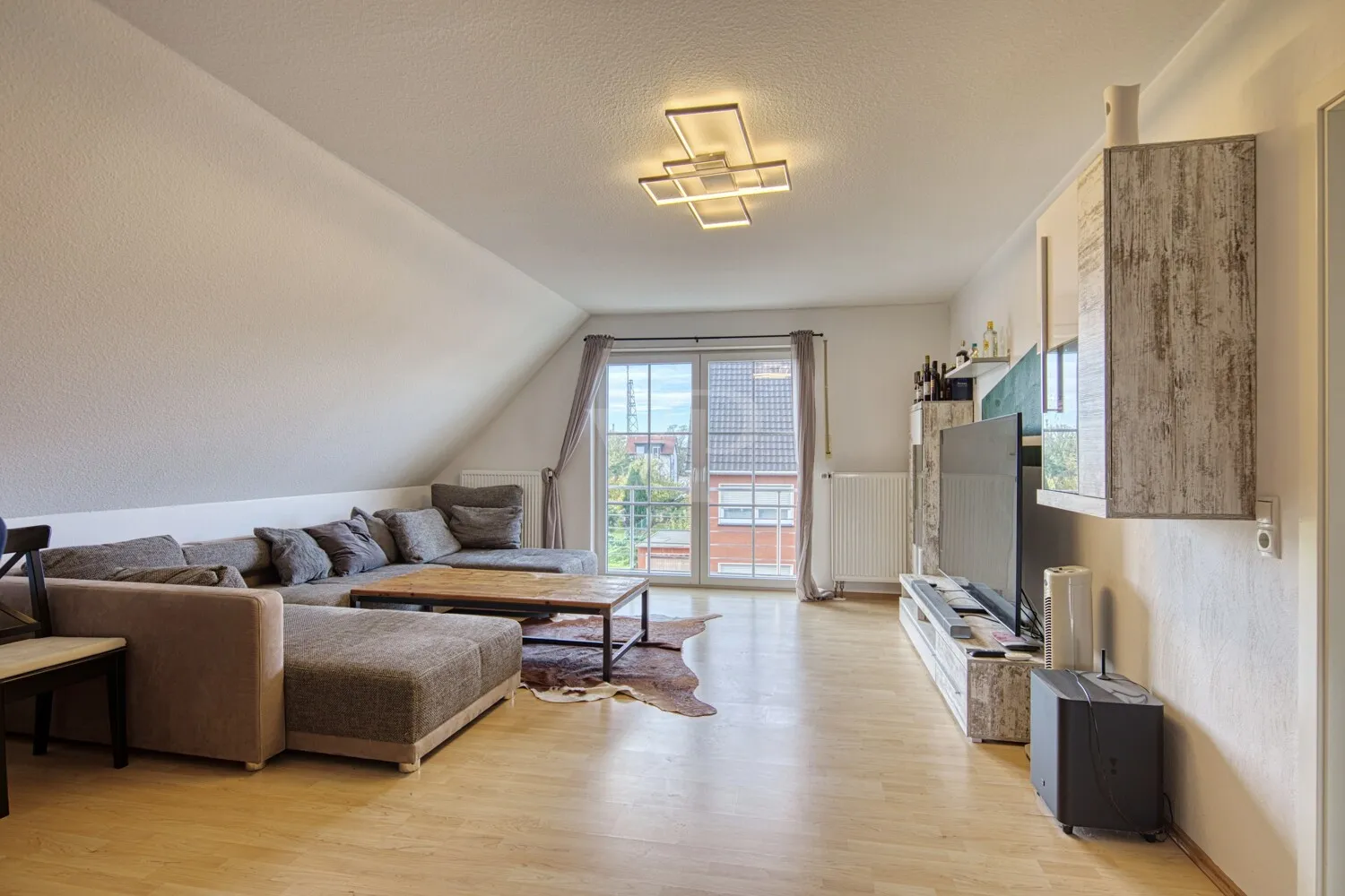 Wohnzimmer der Einliegerwohnung im Dachgeschoss